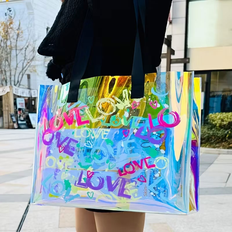 Event & Party Supply Photos - ファッショナブルなレーザープリントのハンドバッグ。PVCゼリー素材で作られており、女性の日常使いに最適です。デート、スポーツイベント、コンサート、カジュアルな外出、お祭りの日に最適で、水泳用バッグとしても使用できます。